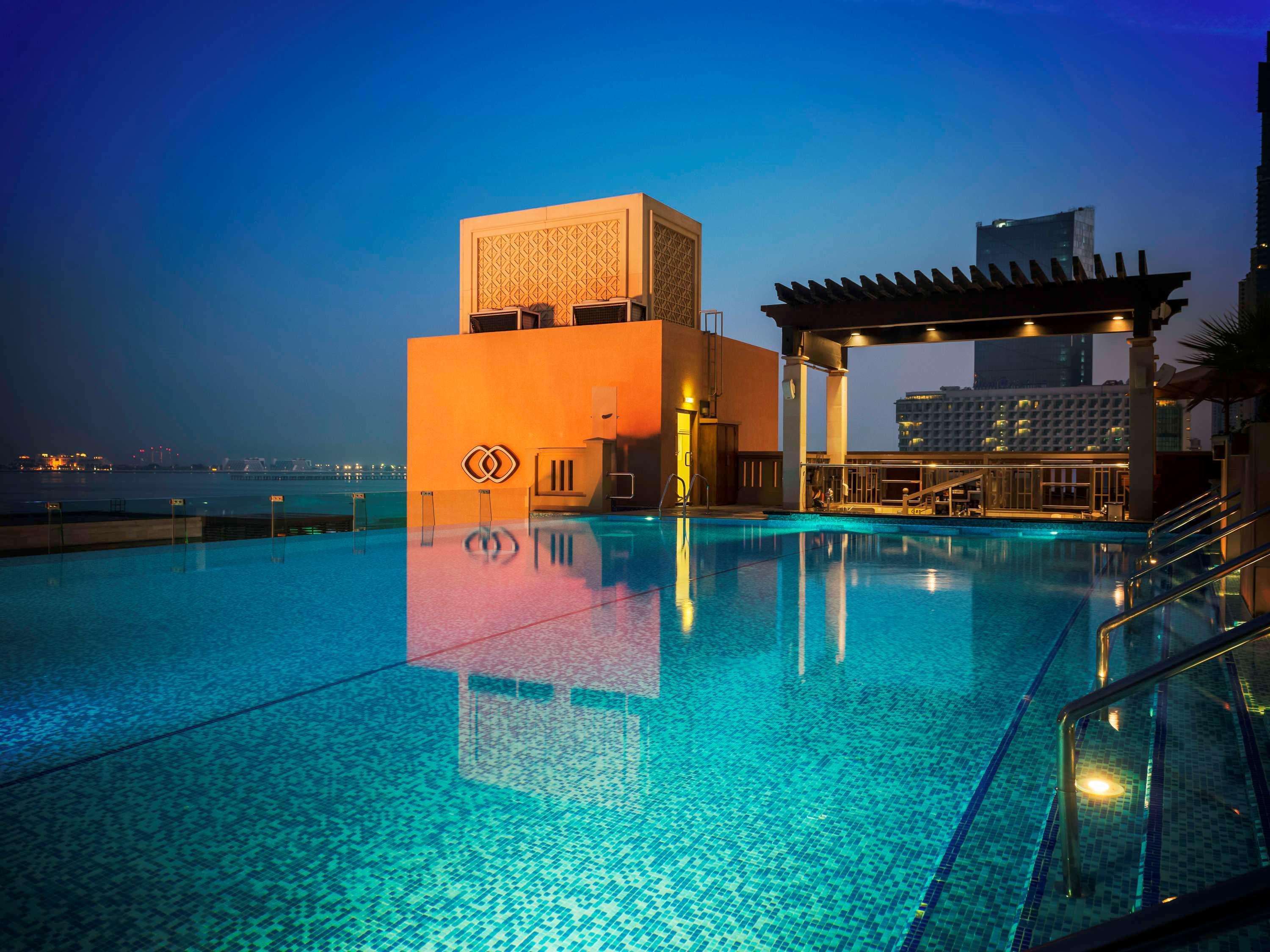 Sofitel Dubai Jumeirah Beach Exterior photo The pool at the hotel