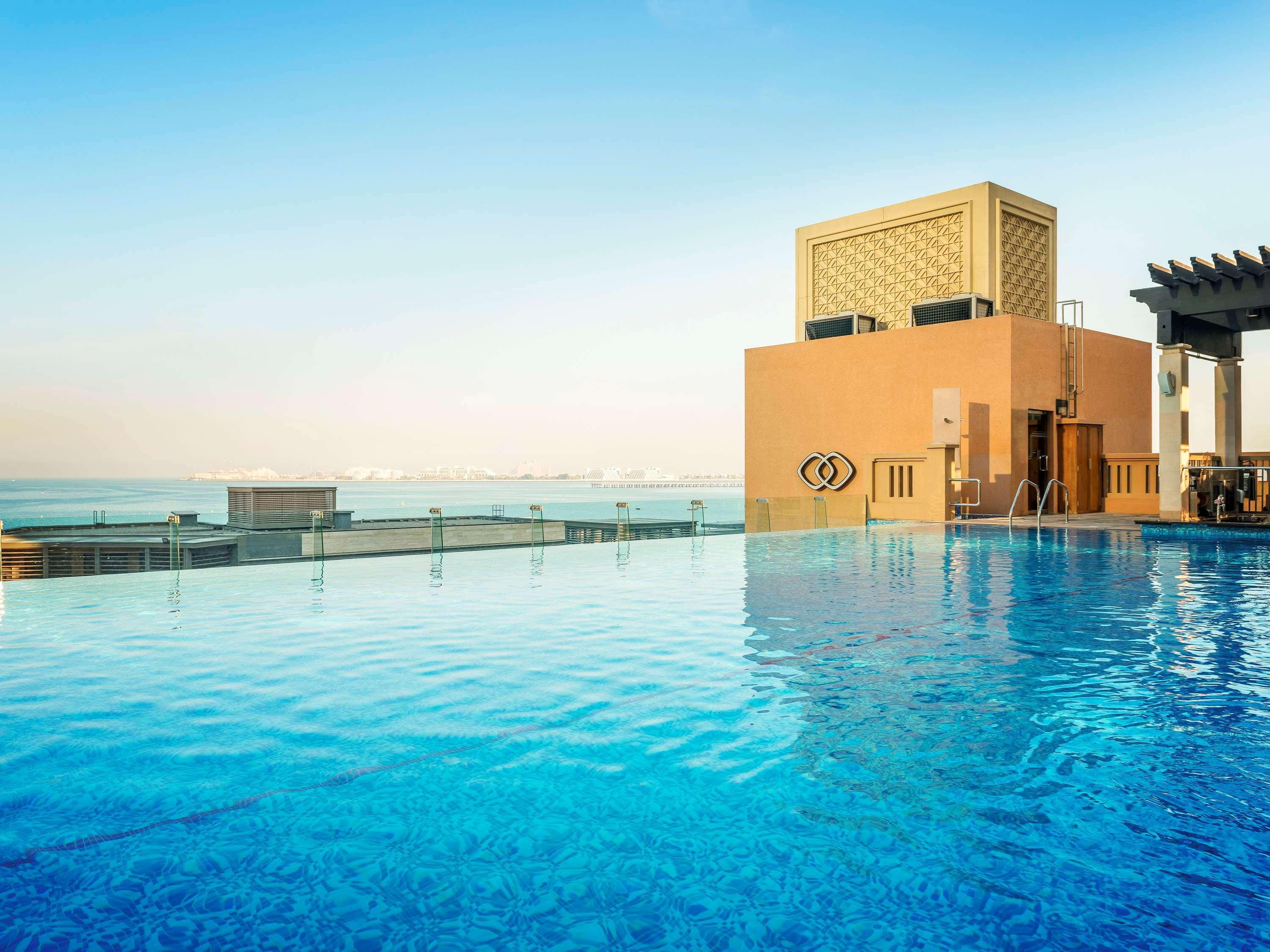 Sofitel Dubai Jumeirah Beach Exterior photo The pool at Jumeirah Jumeirah